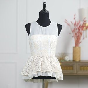 Floreat White Sleeveless Peplum Blouse